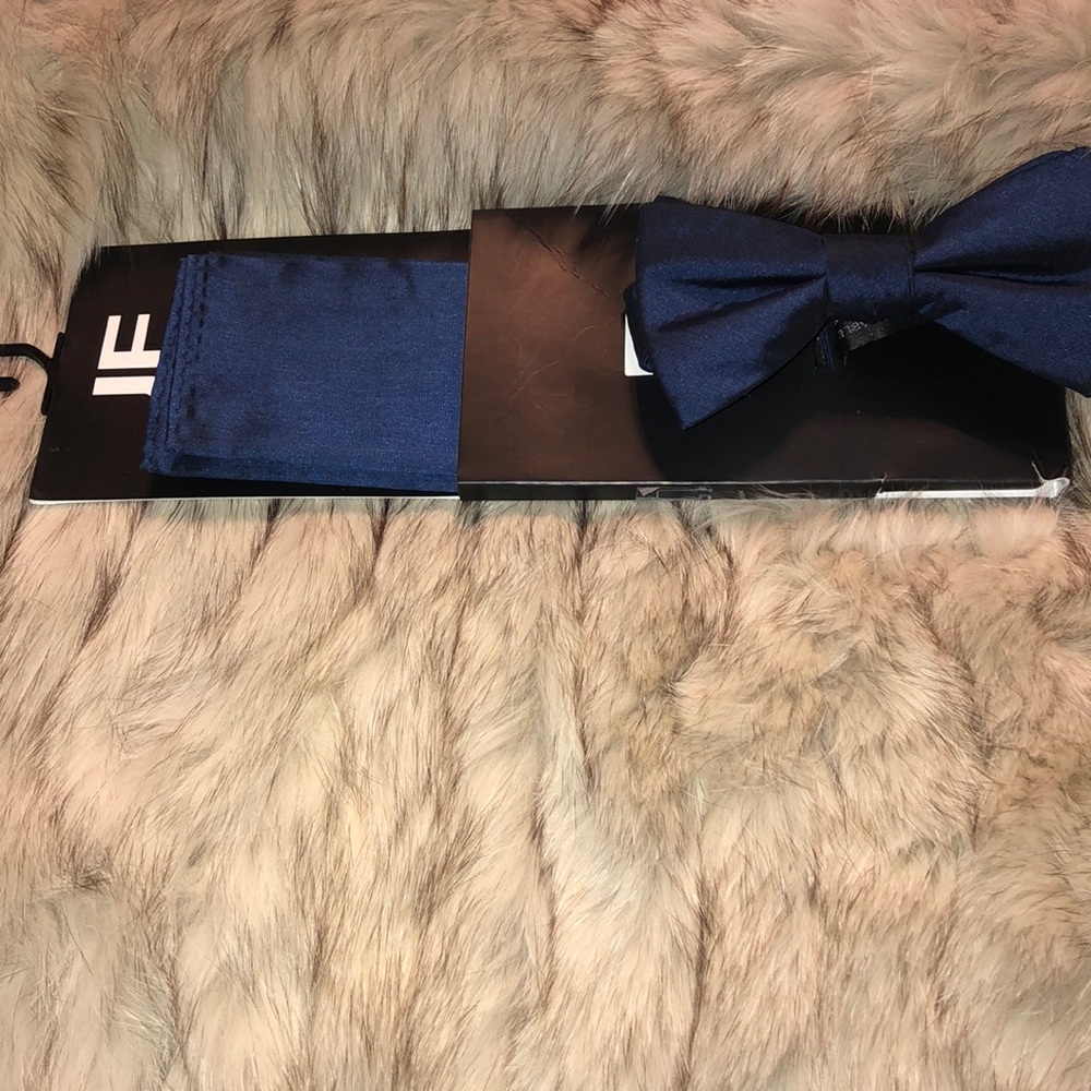 Pre-tied bowtie and pocket square.